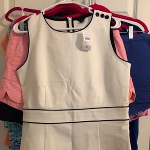 NWT Ann Taylor sleeveless top with bottom detail.